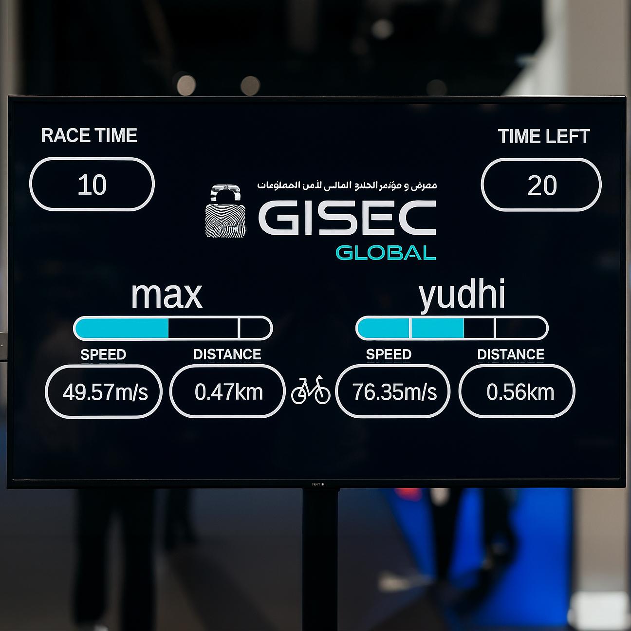 Guests racing on interactive bike game at corporate event in Dubai
